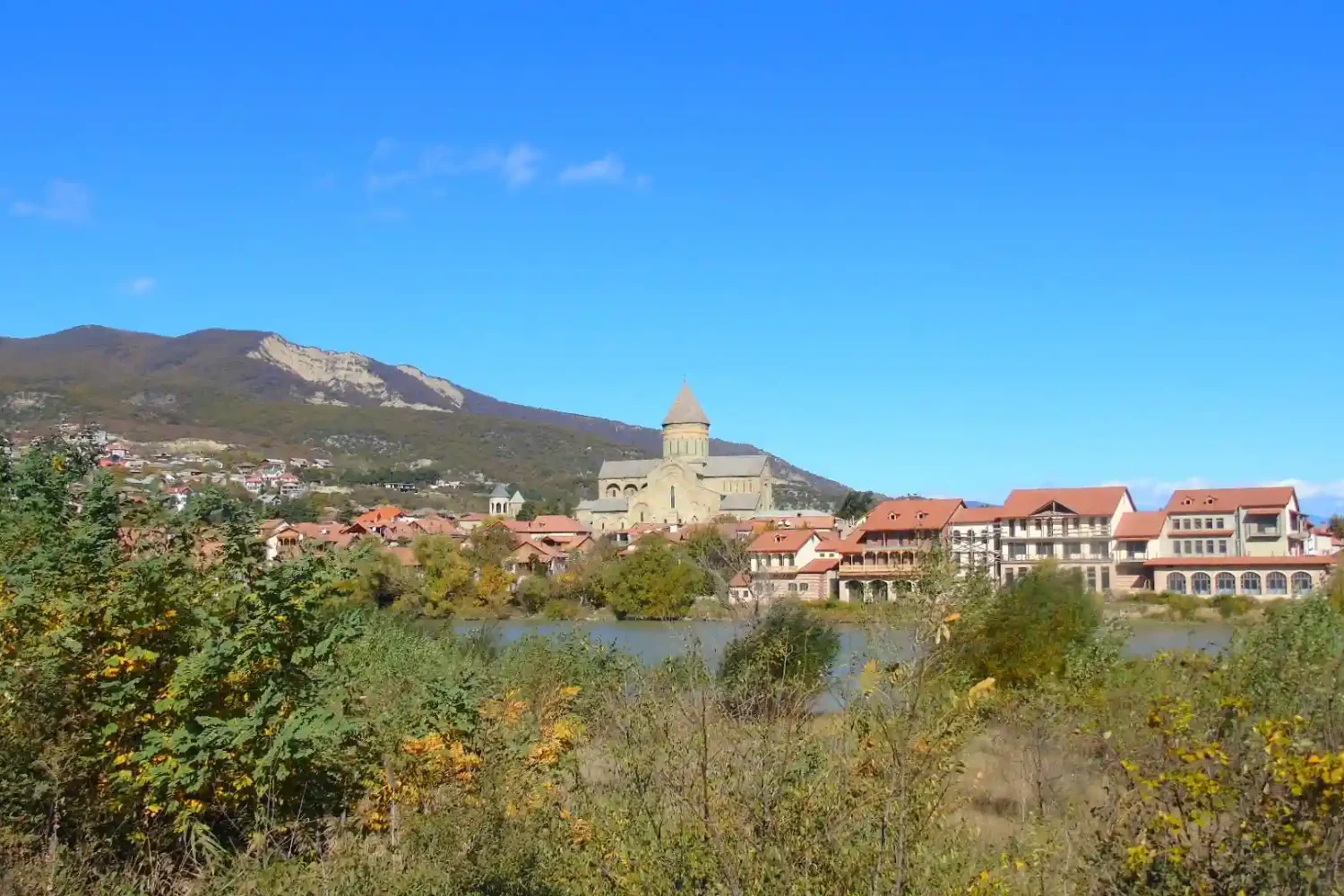 View of Mtskheta settlement and Svetitskhoveli across Mtkvari river - Day trip from Tbilisi to Mtskheta