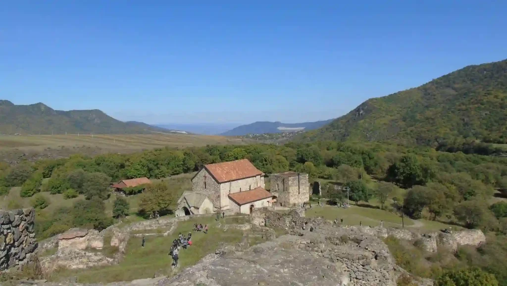 Tourists exploring the ancient temple and fortress in Dmanisi - Day trip Dmanisi from Tbilisi