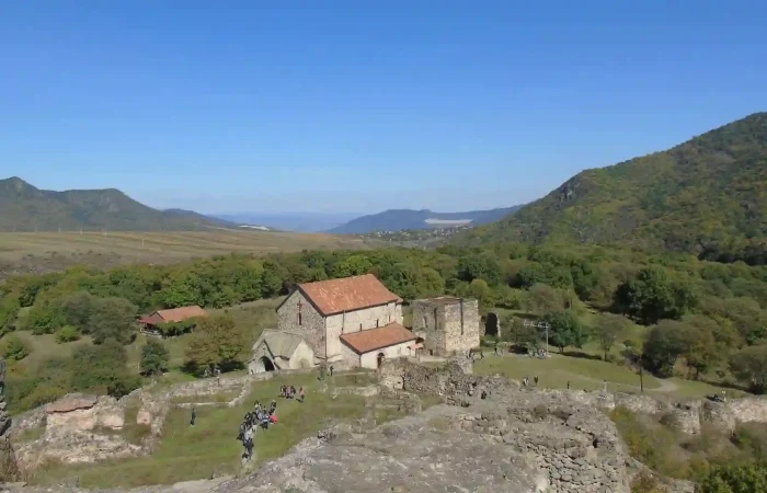 Tourists exploring the ancient temple and fortress in Dmanisi - Day trip Dmanisi from Tbilisi