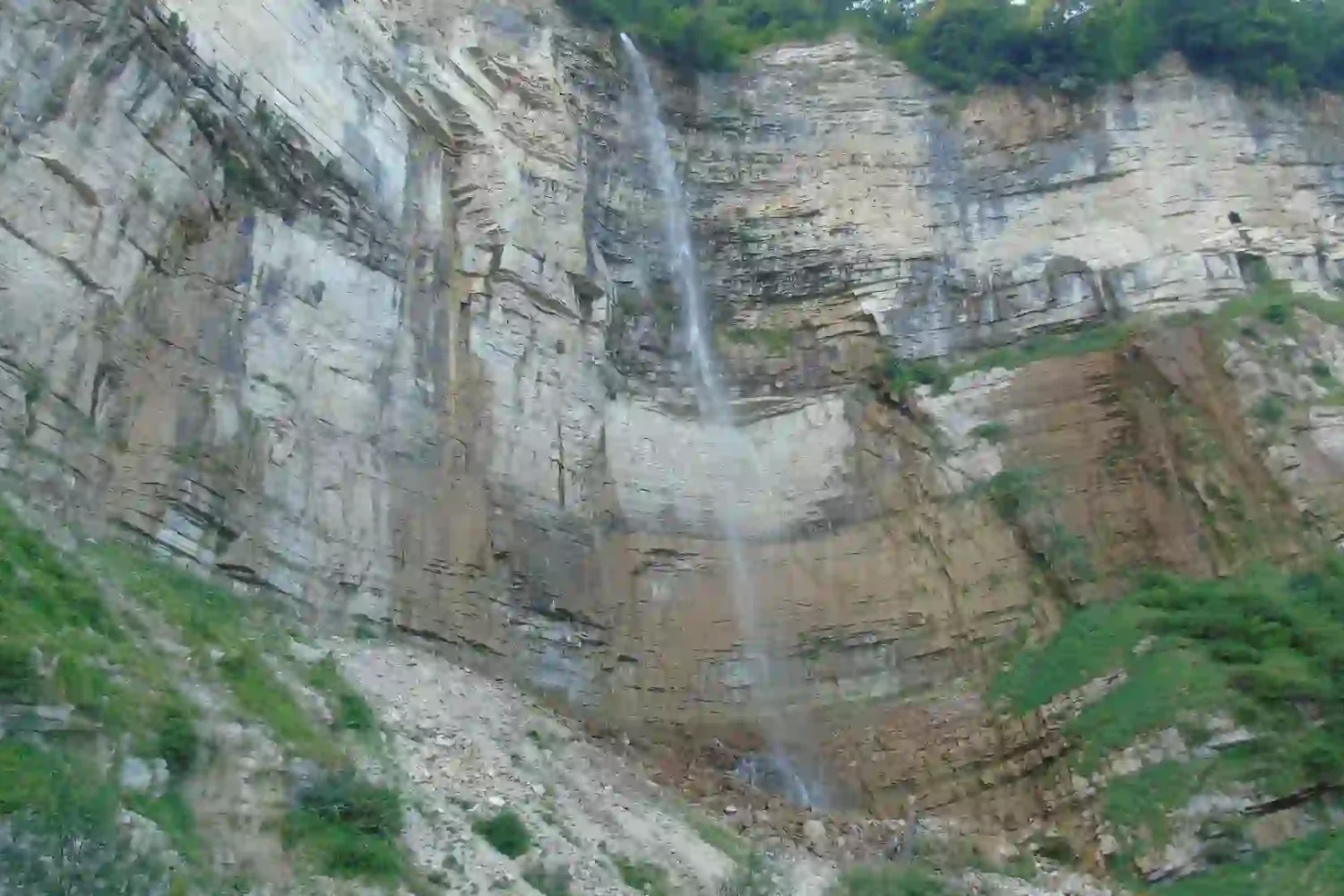 The powerful stream of Kinchkha waterfall in the Khoni region.