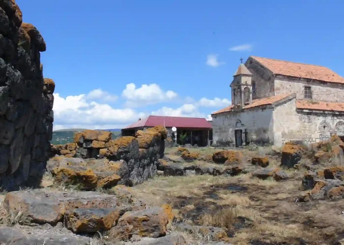 Contrast of prehistoric megaliths and medieval architecture in Saro - Megalithic Tour Georgia