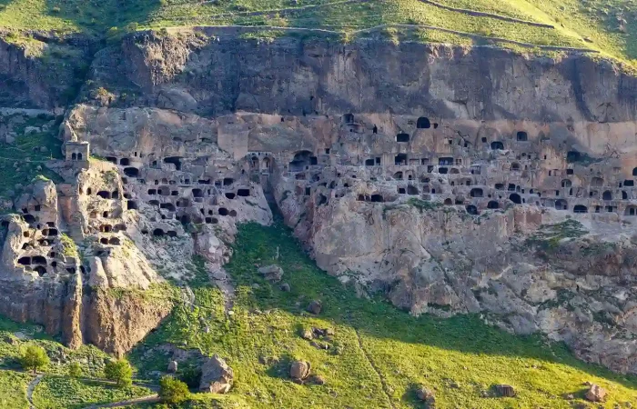 The entire Vardzia complex seen from the opposite mountain range