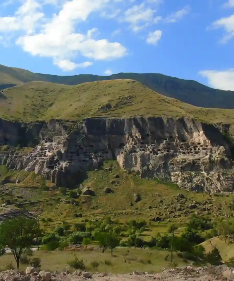 The entire Vardzia complex seen from the opposite mountain range