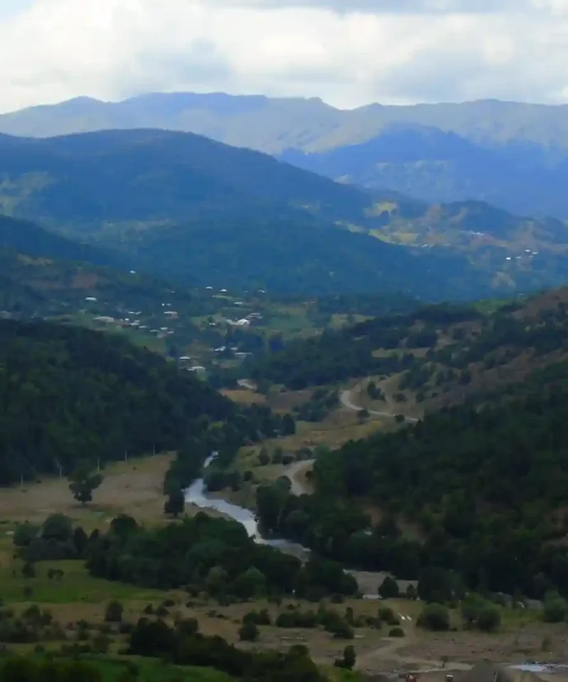 The scenic Mtkvari river valley and rugged mountains of the Meskheti region in Georgia - Travel Destinations in Georgia. Georgia.